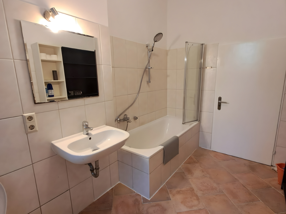 City Hideaways Ferienwohnung Mühle E1 Bad mit Duschwanne