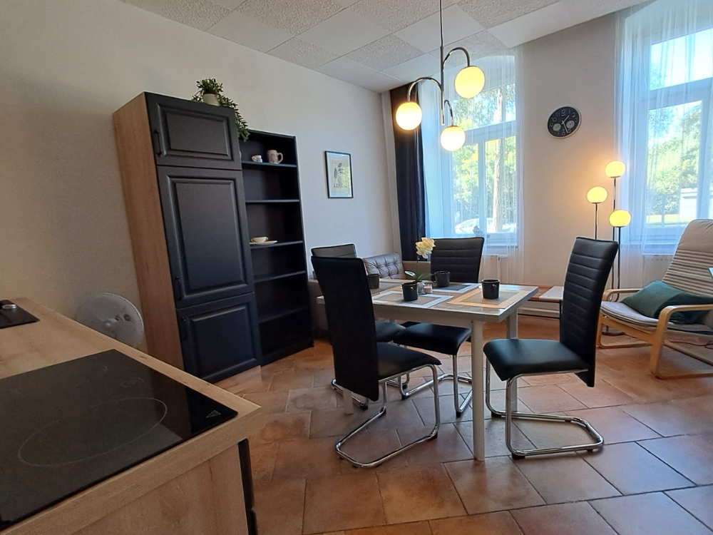 City Hideaways Ferienwohnung Mühle E1 Sitzbereich