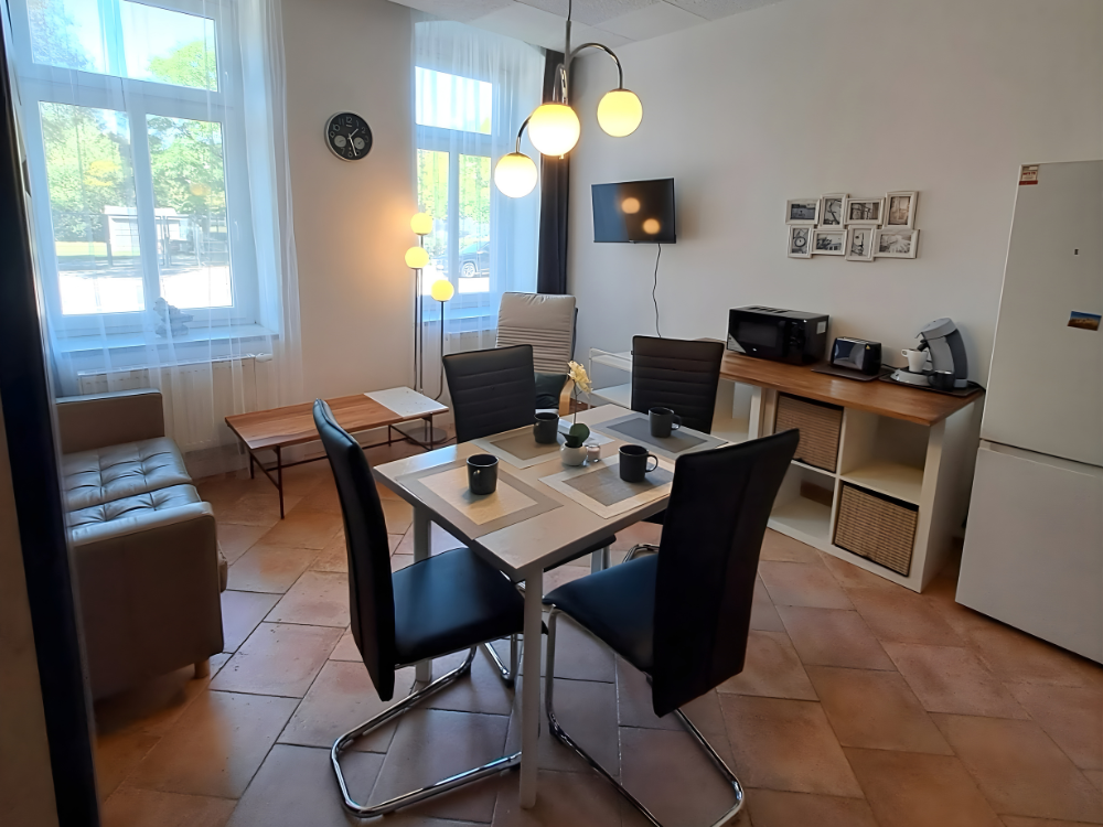 City Hideaways Ferienwohnung Mühle E1 Wohn Essbereich