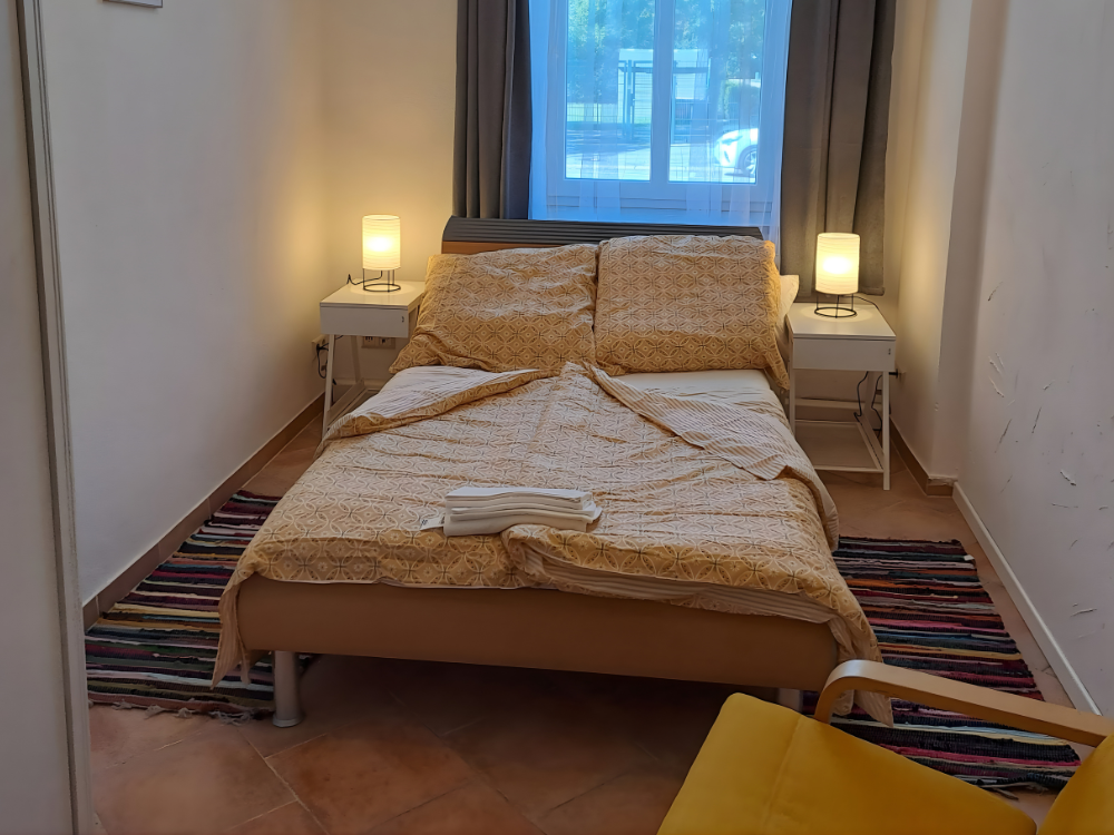 City Hideaways Ferienwohnung Mühle E1 gemütliches Bett