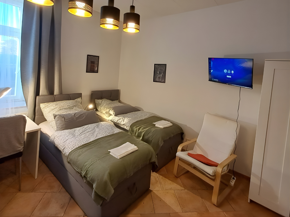 City Hideaways Ferienwohnung Mühle E2 Schlafzimmer mit 2 Betten