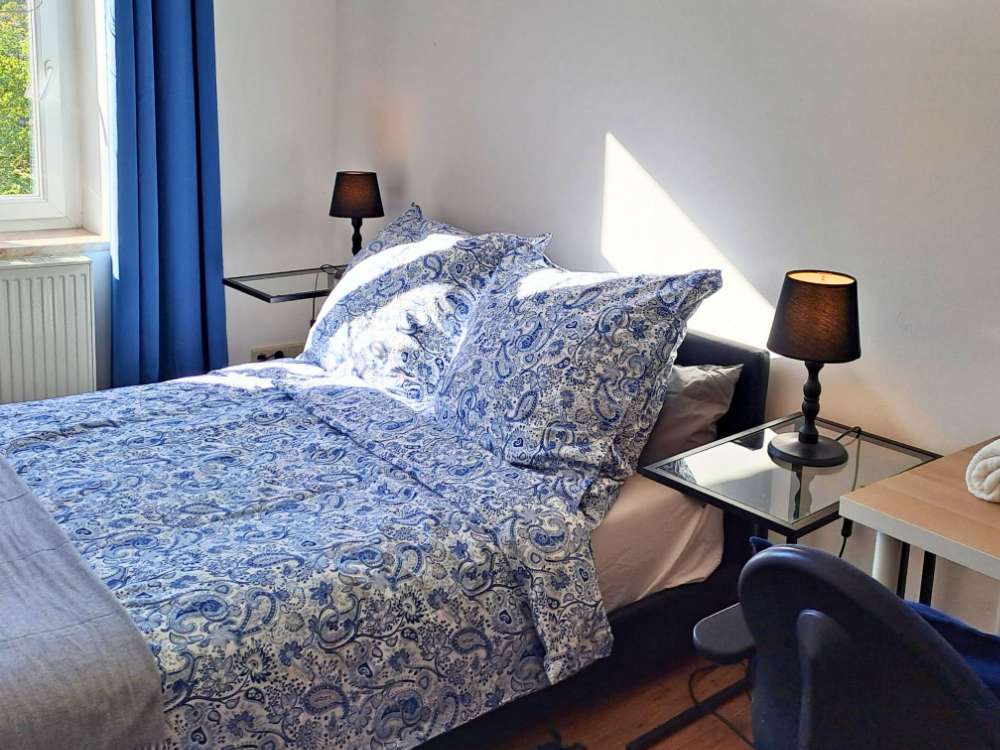 City Hideaways Ferienwohnung Mühle O2 Bett
