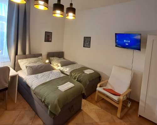City Hideaways Ferienwohnung Mühle E2 Schlafzimmer mit 2 Betten