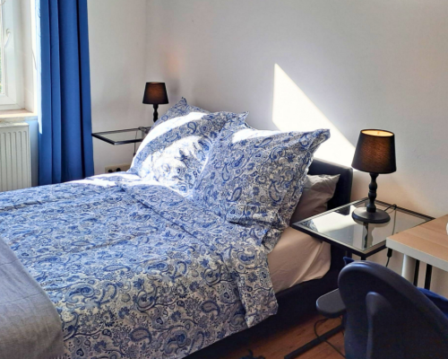 City Hideaways Ferienwohnung Mühle O2 Bett